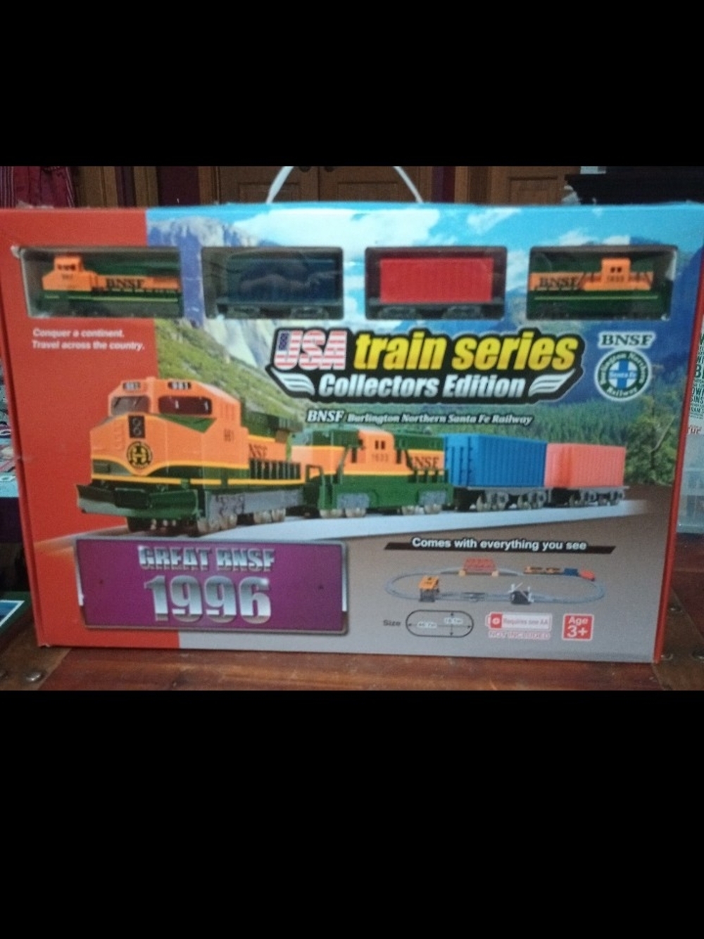NSF Train Set with Orange and Green Locomotive and Colorful Cars